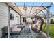 Cozy patio featuring an outdoor seating area with lights for evening relaxation at 986 S Jersey St, Denver, CO 80224