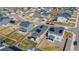 View of homes from above in a well-planned neighborhood featuring landscaped yards and street parking at 915 N Waterloo Ct, Aurora, CO 80018