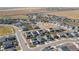 Overhead shot of a new construction community displaying single Gathering homes and a central playground at 915 N Waterloo Ct, Aurora, CO 80018