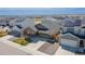 Aerial view of home highlighting the lawn, landscaping and driveway at 915 N Waterloo Ct, Aurora, CO 80018
