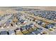 Expansive aerial view showcases a vibrant residential community with modern homes and well-maintained streets at 915 N Waterloo Ct, Aurora, CO 80018