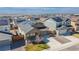 Charming single-Gathering home featuring a well-maintained lawn, two car garage, and solar panels at 915 N Waterloo Ct, Aurora, CO 80018