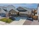 Inviting single-Gathering home boasts a two-car garage, front porch, and professionally landscaped yard at 915 N Waterloo Ct, Aurora, CO 80018