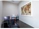 A modern and functional office space designed for productivity with a large world map art piece at 915 N Waterloo Ct, Aurora, CO 80018