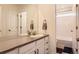 Bathroom with double vanity and shower/tub combo at 9308 Inca Dove Cir, Littleton, CO 80125