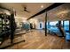Modern gym with various equipment and scenic views at 9308 Inca Dove Cir, Littleton, CO 80125