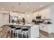 Open concept kitchen with granite countertops and stainless steel appliances at 9308 Inca Dove Cir, Littleton, CO 80125