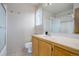 Bright bathroom with a vanity, mirror, and shower-tub combination at 10510 Inspiration Dr, Parker, CO 80138