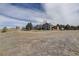 Sprawling home on acreage features mature trees and charming curb appeal at 10510 Inspiration Dr, Parker, CO 80138