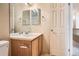 Bathroom featuring vanity with cream countertops, sink and traditional mirror at 1978 Granger Cir, Castle Rock, CO 80109