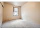 Bedroom featuring plush carpeting, window with blinds, and closet with sliding doors at 1978 Granger Cir, Castle Rock, CO 80109