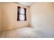 Bedroom with neutral carpet, a window with curtains, and electrical outlets at 1978 Granger Cir, Castle Rock, CO 80109