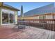 Wooden deck with metal table and chairs, perfect for outdoor entertaining at 1978 Granger Cir, Castle Rock, CO 80109