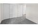 This bedroom features neutral carpet and access to ensuite at 1280 Sable Blvd, Aurora, CO 80011