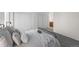 Comfortable bedroom boasts soft bedding, neutral colors, and ample closet space at 1280 Sable Blvd, Aurora, CO 80011