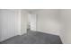 This bedroom features neutral carpet and white walls at 1280 Sable Blvd, Aurora, CO 80011