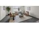 Bright living room showcases stylish seating, neutral decor, and a cozy, inviting atmosphere at 1280 Sable Blvd, Aurora, CO 80011