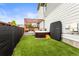 Private backyard with hot tub, deck, pergola, and artificial turf at 9391 E 59Th North Pl, Denver, CO 80238