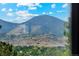 Scenic mountain view from the home, showcasing lush greenery and open space at 4522 S Robb St, Littleton, CO 80127