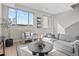 Cozy living room with ample natural light, modern furnishings, and stylish decor at 4733 E Iliff Ave, Denver, CO 80222