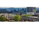Beautiful panoramic city view showcasing a vibrant cityscape with modern buildings and distant mountains at 3198 Blake St # 502, Denver, CO 80205