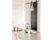 Close-up on kitchen island featuring granite countertop, stainless steel faucet, and modern pendant lights at 3198 Blake St # 502, Denver, CO 80205