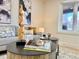 Close-up of stylishly decorated living room with a modern coffee table, neutral-toned sofa, and elegant artwork at 1630 S Valentine Way, Lakewood, CO 80228