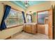 A well-lit bathroom features a vanity, large window, and a tile floor at 3299 Lowell Blvd # 204, Denver, CO 80211