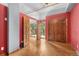 This is a cozy bedroom with a private balcony and wooden floors at 3299 Lowell Blvd # 204, Denver, CO 80211