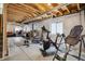 Unfinished basement space offering potential for customization, with fitness equipment and ample room at 11866 High Desert Rd, Parker, CO 80134