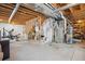 Unfinished basement space with utilities, offering potential for customization and additional living area at 11866 High Desert Rd, Parker, CO 80134