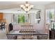 Open dining area adjacent to the living room, offering a seamless flow for entertaining at 11866 High Desert Rd, Parker, CO 80134