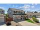 Charming two-story home with a well-manicured front lawn and a basketball hoop at 11866 High Desert Rd, Parker, CO 80134