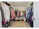 Well-organized walk-in closet with ample shelving, hanging rods, and space for shoe storage at 11866 High Desert Rd, Parker, CO 80134