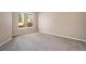 Neutral bedroom with large window and natural light at 8707 E Florida Ave # 709, Denver, CO 80247
