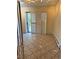 Bright dining area featuring tile floors, and sliding doors with plantation shutters at 2789 S Ivan Way, Denver, CO 80227
