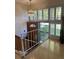 Entryway featuring lots of natural light, open stairway, and chandelier at 2789 S Ivan Way, Denver, CO 80227