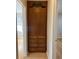 Hallway featuring a built-in wooden cabinet with drawers and storage at 2789 S Ivan Way, Denver, CO 80227
