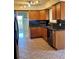 Modern kitchen featuring updated appliances and custom cabinets at 2789 S Ivan Way, Denver, CO 80227