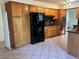 Spacious kitchen with updated appliances and custom cabinets at 2789 S Ivan Way, Denver, CO 80227