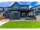 Charming home featuring board and batten siding, and a covered porch at 5608 Grandville Ave, Longmont, CO 80503