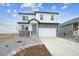 Charming home displaying eye-catching curb appeal, including a paved driveway, and manicured yard at 8322 E 134Th Pl, Thornton, CO 80602