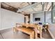 Dining area featuring natural wood table and modern seating at 2100 16Th St # 408, Denver, CO 80202