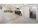 Spacious finished basement features plush carpeting, a stylish rug, and a comfortable seating area at 3085 W 36Th Ave, Denver, CO 80211