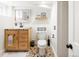 Updated bathroom features a stylish vanity, mosaic tile flooring, and modern fixtures at 3085 W 36Th Ave, Denver, CO 80211