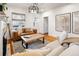 Bright dining room with hardwood floors and open layout at 3085 W 36Th Ave, Denver, CO 80211