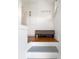 Inviting entryway features built-in storage, a bench with shoe storage, and a bright, clean aesthetic at 3085 W 36Th Ave, Denver, CO 80211