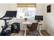 Bright office featuring a modern desk, ergonomic chair, exercise equipment, and natural light at 3085 W 36Th Ave, Denver, CO 80211