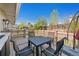 Backyard deck with outdoor seating, offering a relaxing space for entertaining at 5429 S Waco St, Centennial, CO 80015