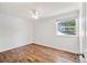 Bright, well-lit bedroom has a window and wood-look flooring at 5429 S Waco St, Centennial, CO 80015